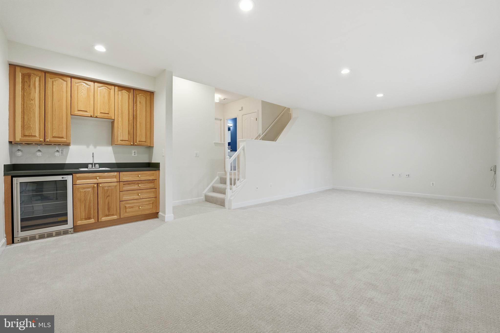 1919 Logan Manor Drive Reston, VA 20190 - Photo 41 of 54 a view of a kitchen with a sink and cabinets
