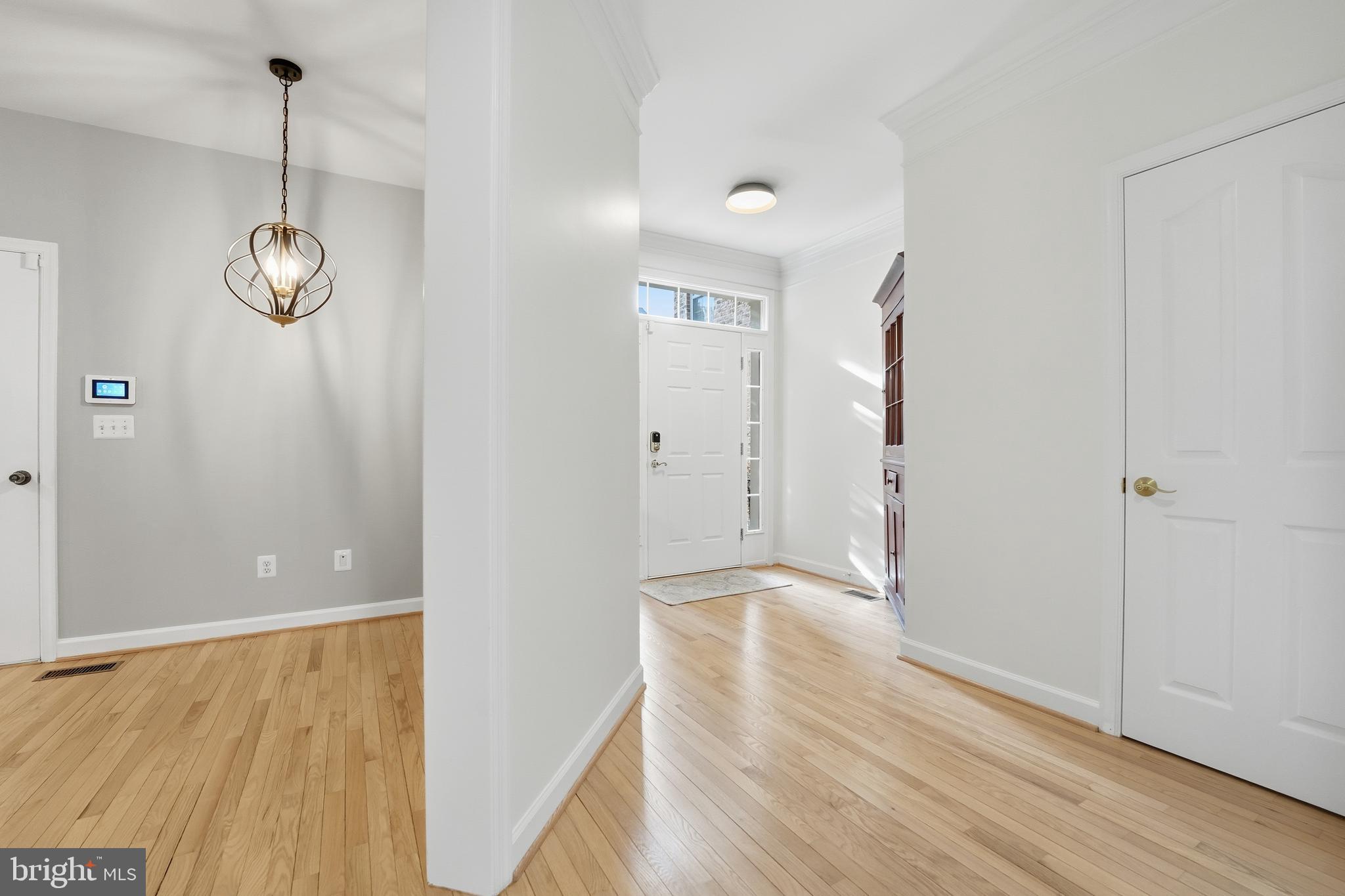 1919 Logan Manor Drive Reston, VA 20190 - Photo 48 of 54 a view of empty room with wooden floor