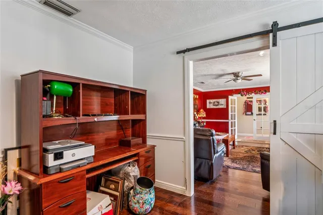 a bedroom with bed and a window