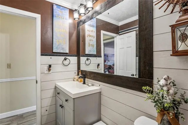 a lobby with furniture and floor to ceiling window