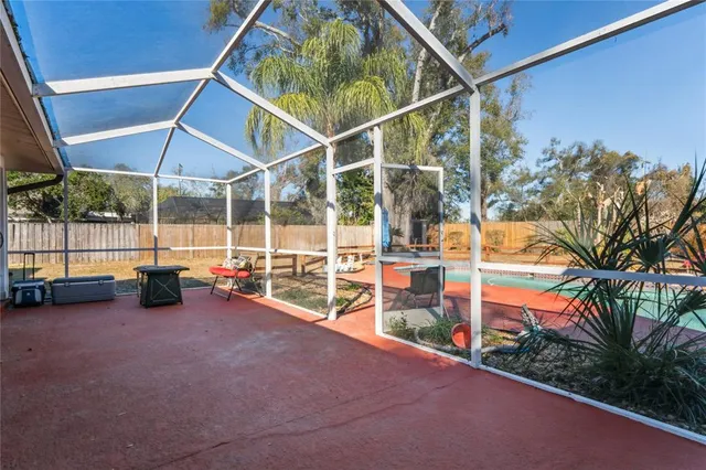 a view of outdoor space with garden and seating area