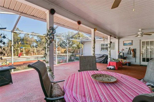 a view of a swimming pool with a lounge chairs