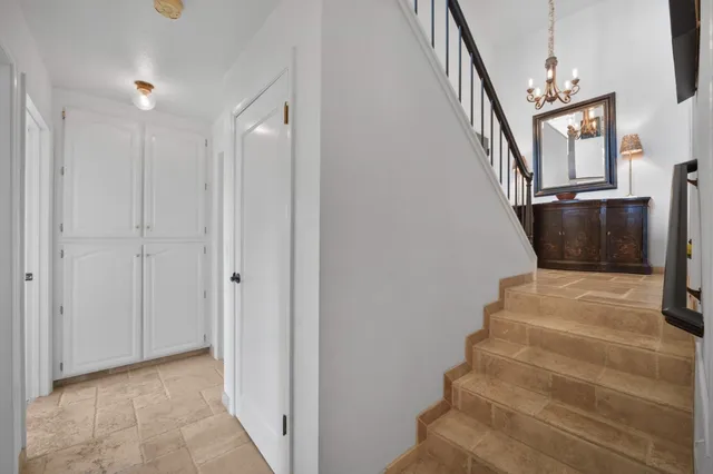 a spacious bathroom with a sink a mirror and a bathtub