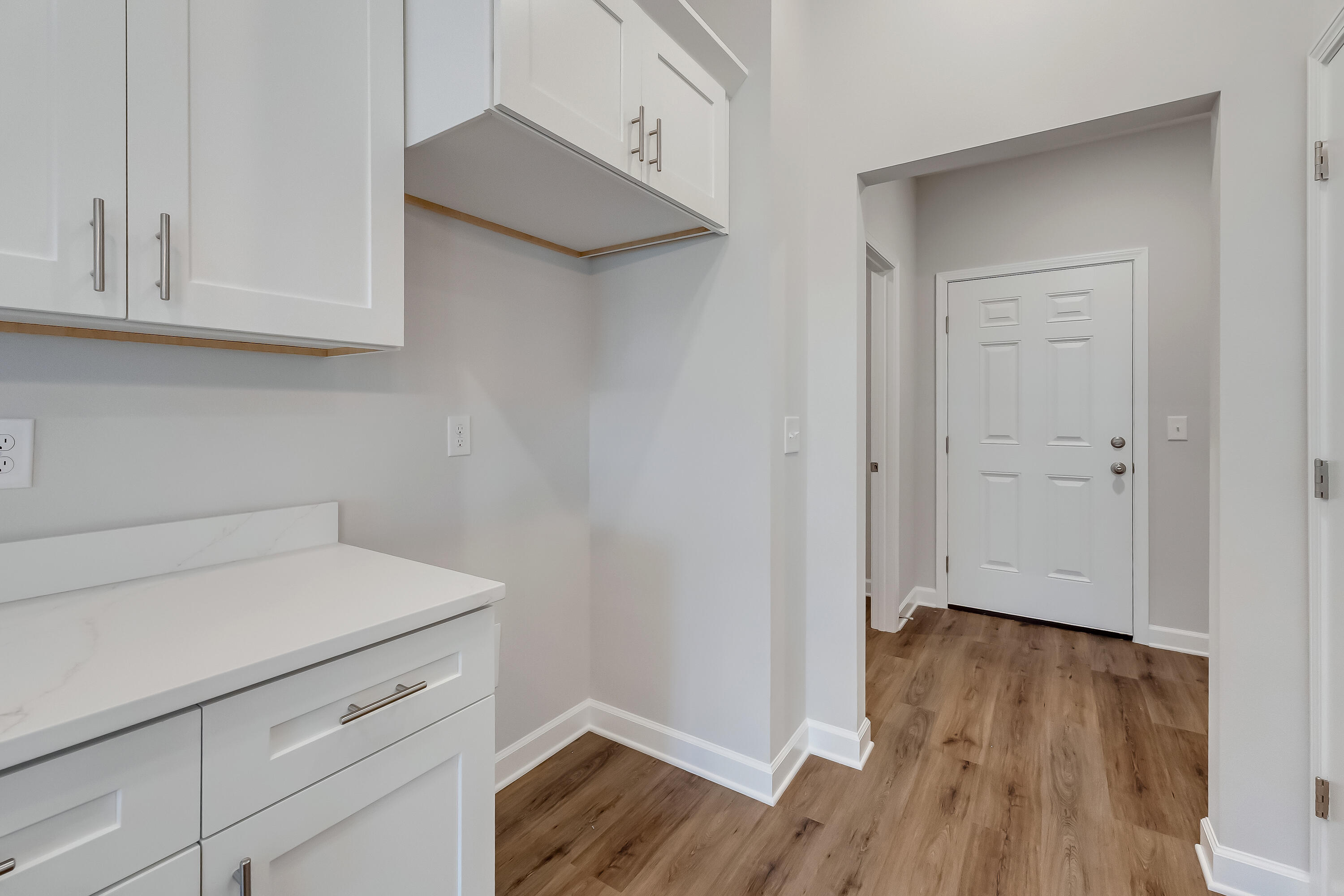 106 Huron Trail Crestview, FL 32536 - Photo 18 of 44 a view of storage and utility room in wooden floor