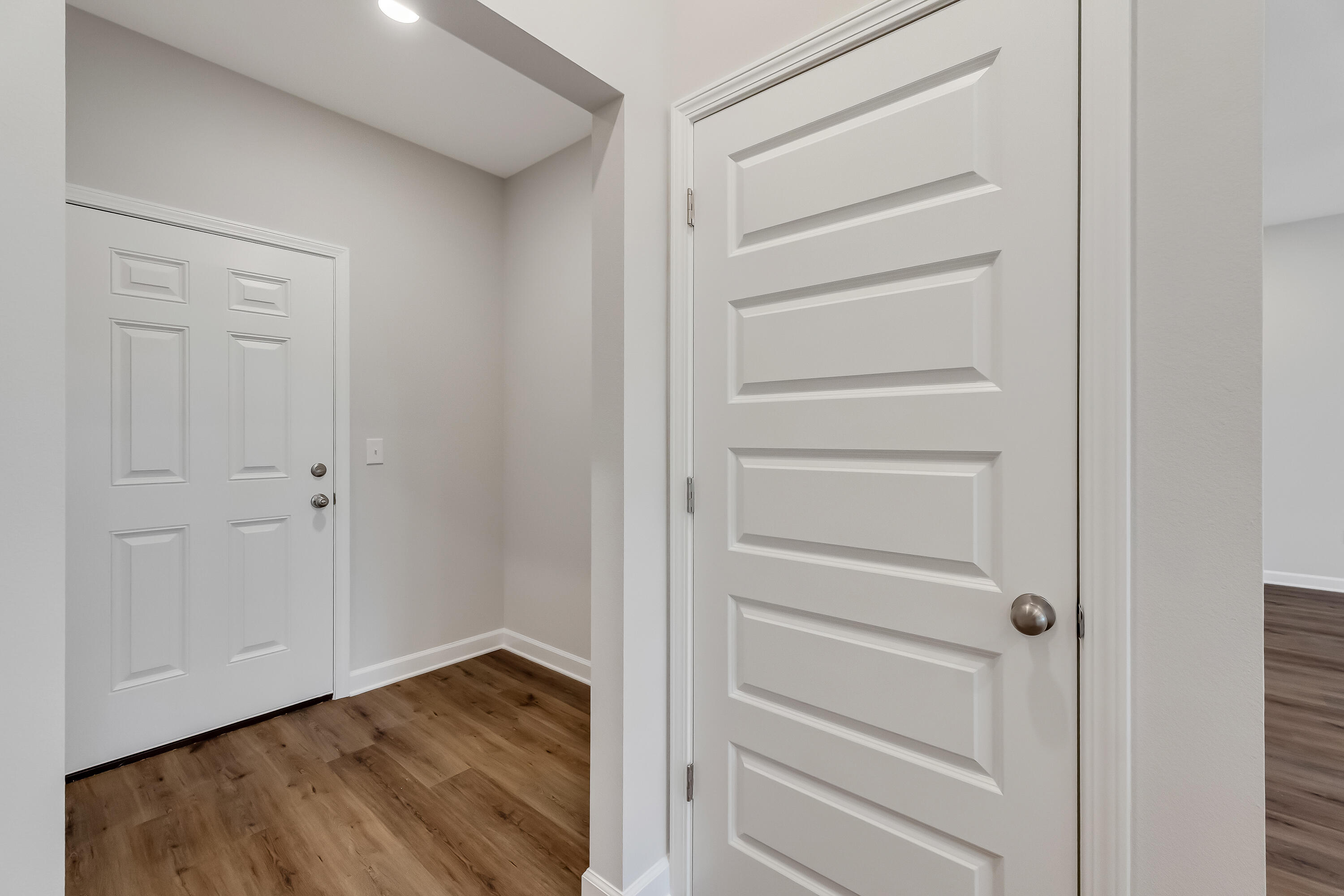 106 Huron Trail Crestview, FL 32536 - Photo 20 of 44 a view of walk in closet with empty racks