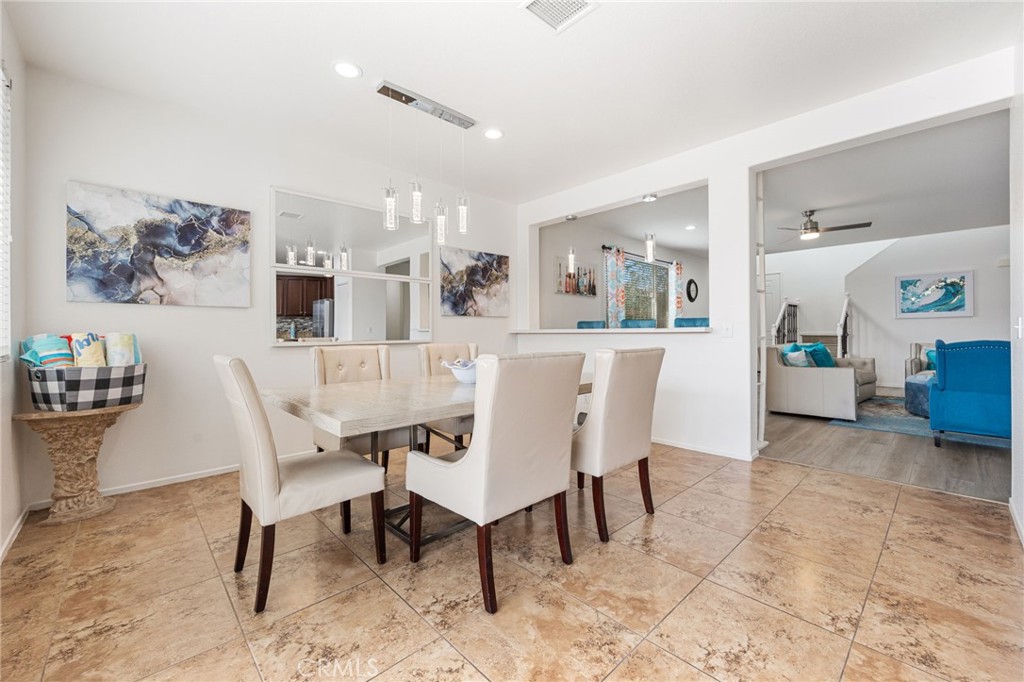 84155 Tramonto Way Indio, CA 92203 - Photo 14 of 38 a view of a dining room with furniture