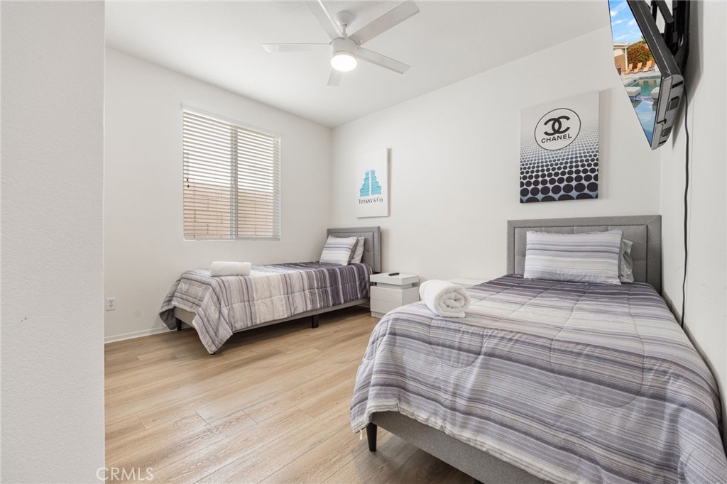 84155 Tramonto Way Indio, CA 92203 - Photo 25 of 38 a bedroom with a bed and a window