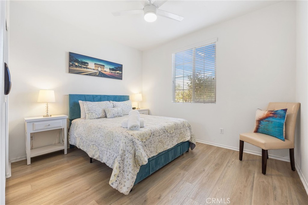 84155 Tramonto Way Indio, CA 92203 - Photo 27 of 38 a bedroom with a bed and a table