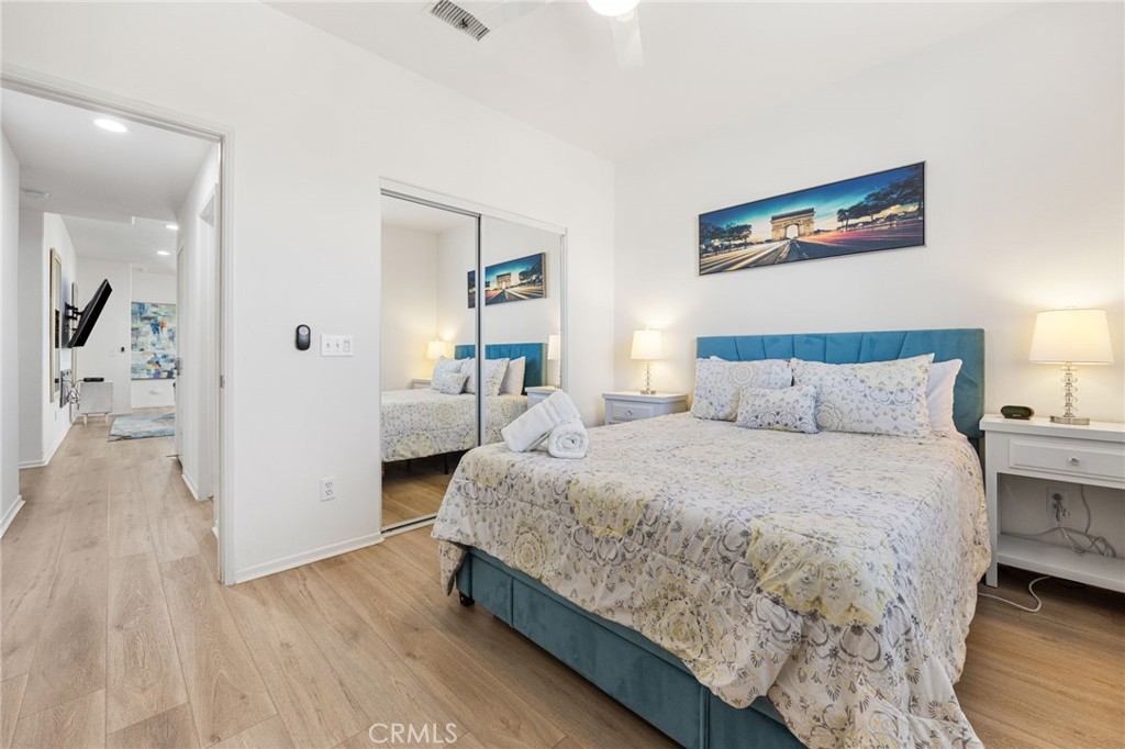 84155 Tramonto Way Indio, CA 92203 - Photo 28 of 38 a bedroom with a bed and a view of kitchen