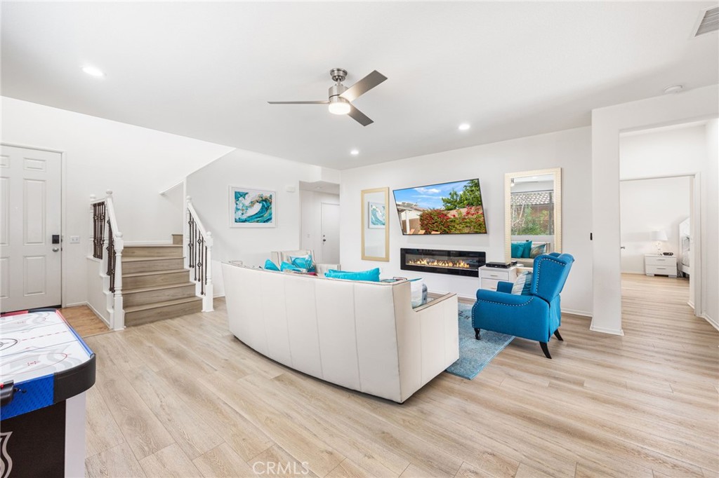 84155 Tramonto Way Indio, CA 92203 - Photo 10 of 38 a living room with furniture and a flat screen tv