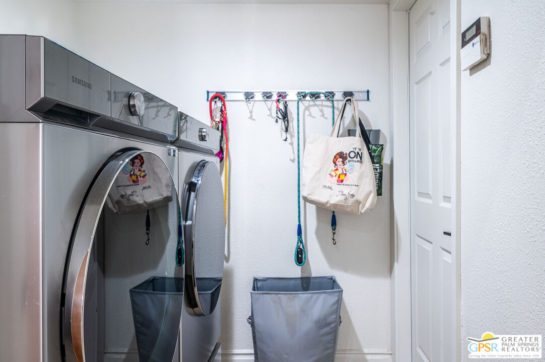 68210 Bella Vista Road Cathedral City, CA 92234 - Photo 20 of 47 a utility room with dryer and washer