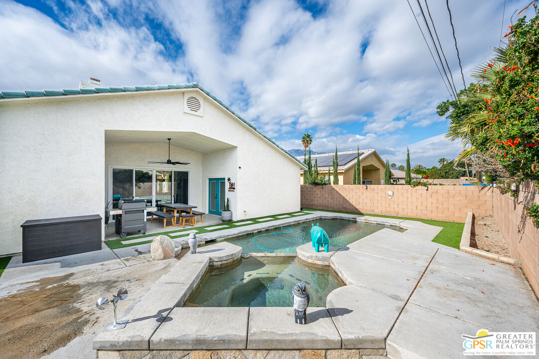 68210 Bella Vista Road Cathedral City, CA 92234 - Photo 34 of 47 a view of a backyard with sitting area