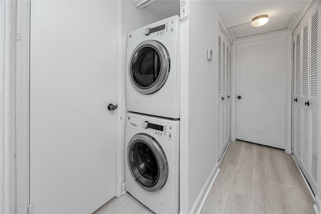 2207 Belleair Road, Unit B4 Clearwater, FL 33764 - Photo 18 of 37 a view of a hallway with washer and dryer