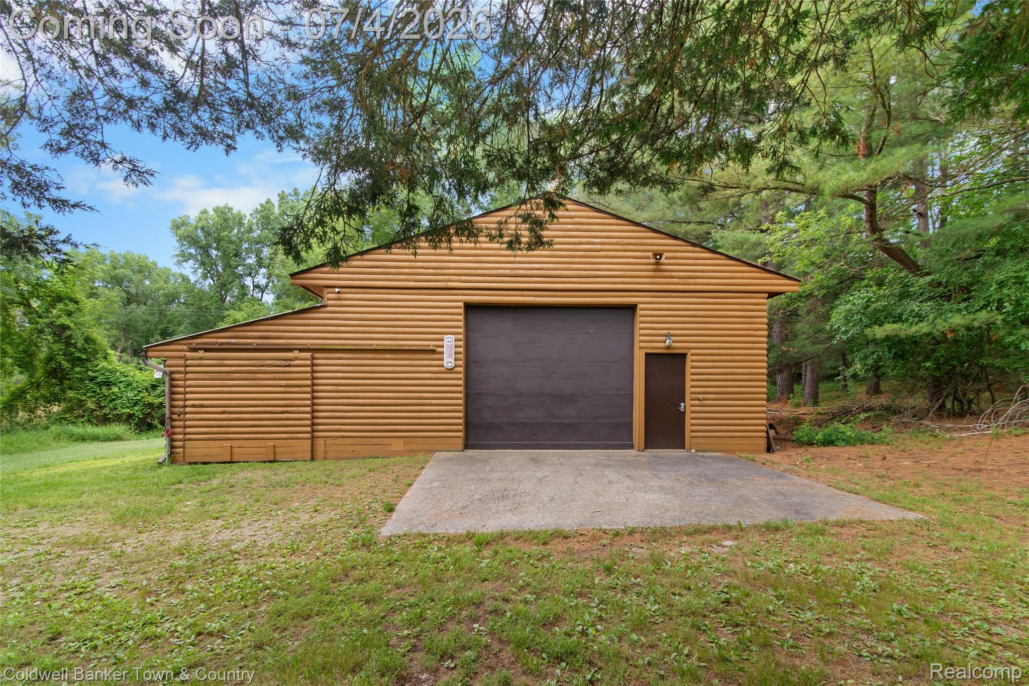 7335 Richardson Road Howell, MI 48843 - Photo 13 of 54 Freestanding ancillary building featuring horizontal wood siding