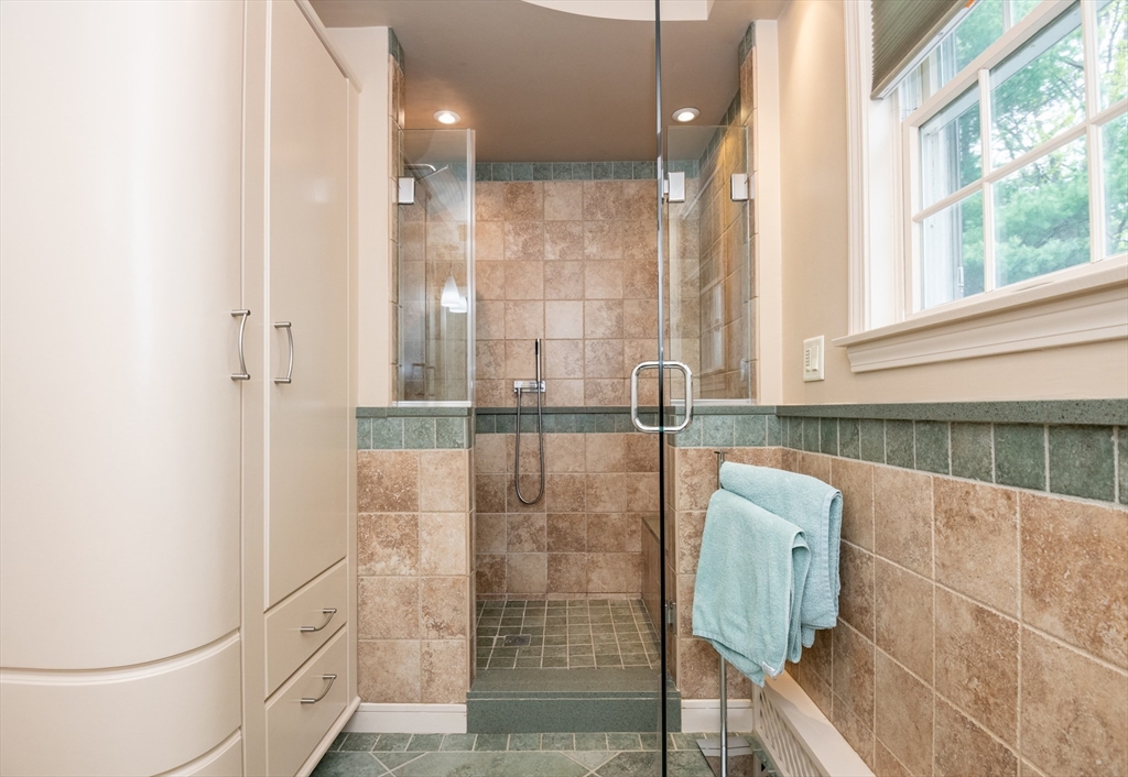 25 Ellen Road Stoneham, MA 02180 - Photo 32 of 41 a bathroom with a shower