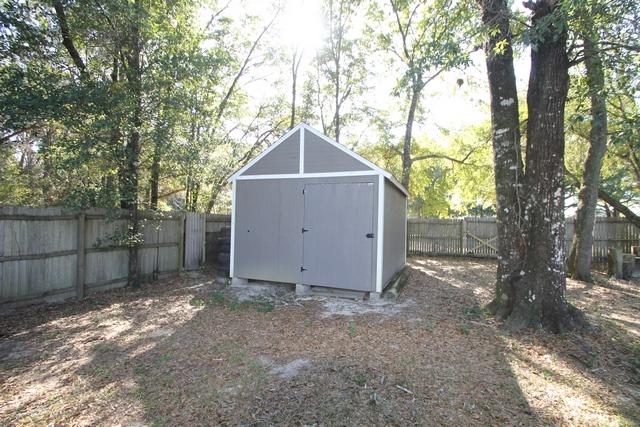 192 Mary Lane Crestview, FL 32536 - Photo 12 of 15 a house with trees in front of it