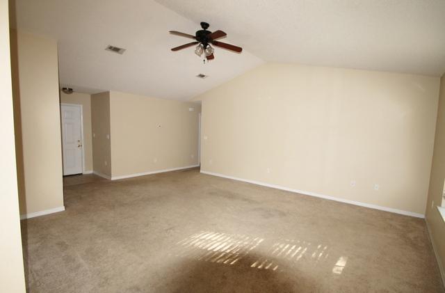 192 Mary Lane Crestview, FL 32536 - Photo 4 of 15 a view of a big room with carpet