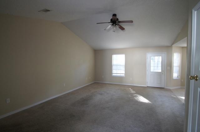 192 Mary Lane Crestview, FL 32536 - Photo 5 of 15 a view of empty room with windows