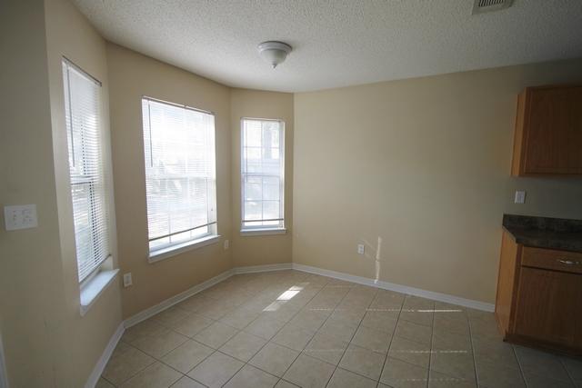 192 Mary Lane Crestview, FL 32536 - Photo 6 of 15 a view of an empty room with a window