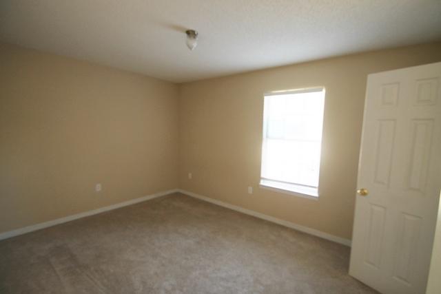 192 Mary Lane Crestview, FL 32536 - Photo 7 of 15 an empty room with a window