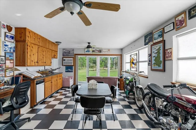 a very nice looking living room with a large window