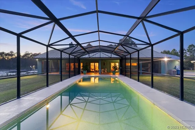 a view of a swimming pool with a porch