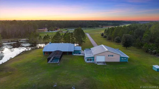 a view of a garden with an outdoor space