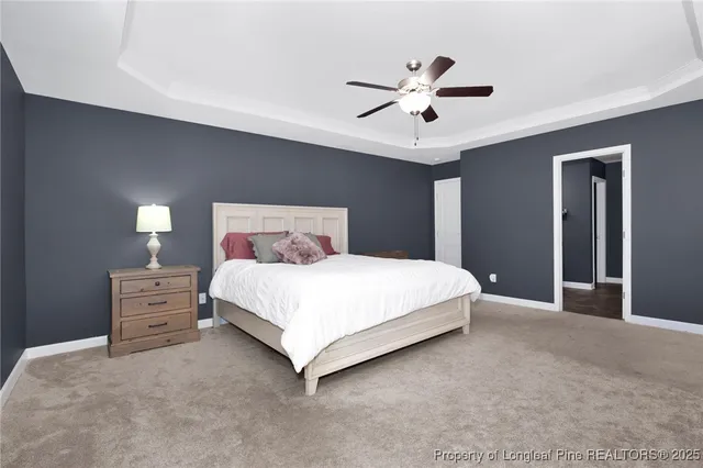 a bedroom with a bed and closet