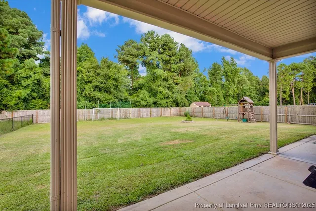 a view of a sitting area and garden