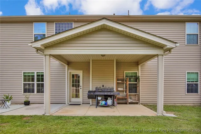 a view of house with a outdoor seating