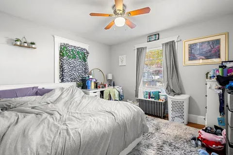 a bathroom with a sink a mirror and a toilet