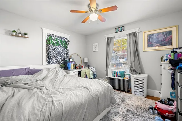 a bathroom with a sink a mirror and a toilet