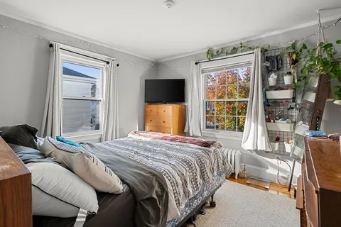 a white sink sitting next to a white toilet