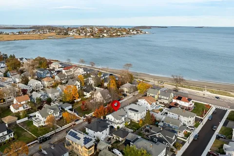 an aerial view of beach and ocean