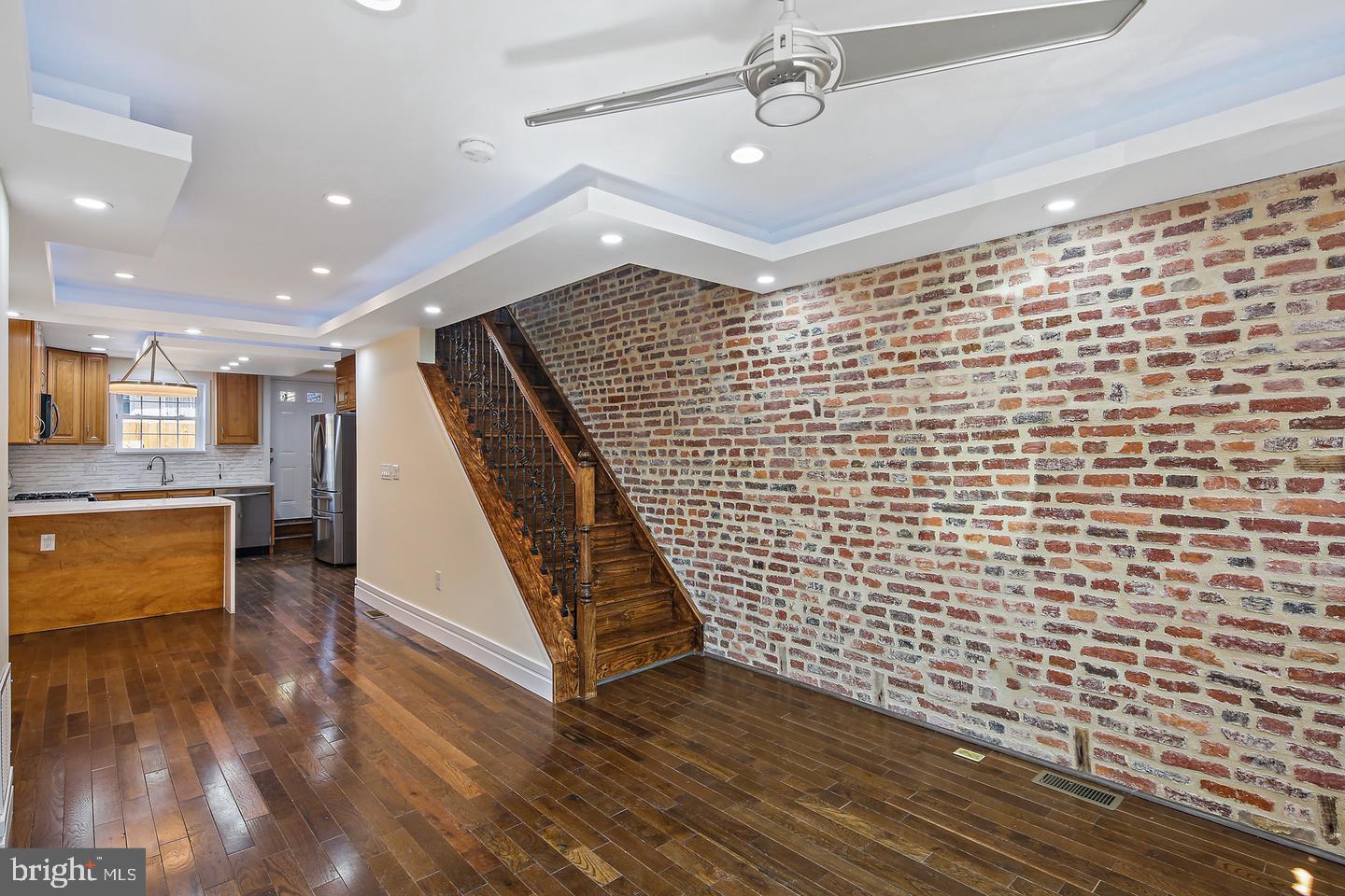 a view of entryway with wooden floor