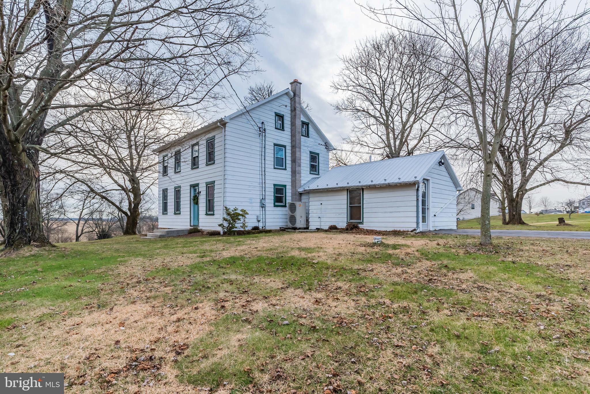 780 Longs Gap Road Carlisle, PA 17013 - Photo 3 of 31 Windows provide warmth of natural light