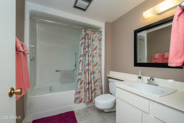 a bathroom with a sink a toilet and a bathtub