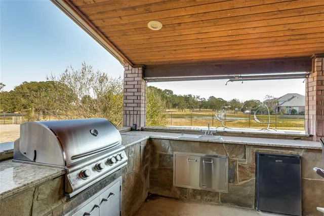 a kitchen with a stove and a microwave