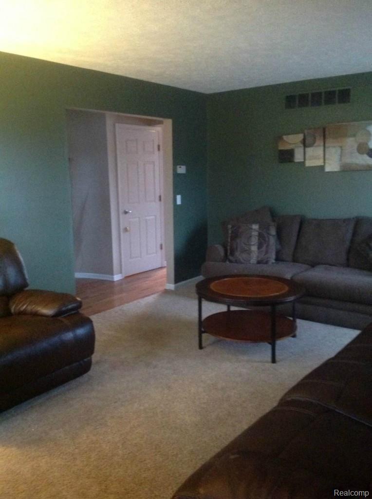 6300 Baker Road Howell, MI 48843 - Photo 8 of 16 Living Room (1).jpg