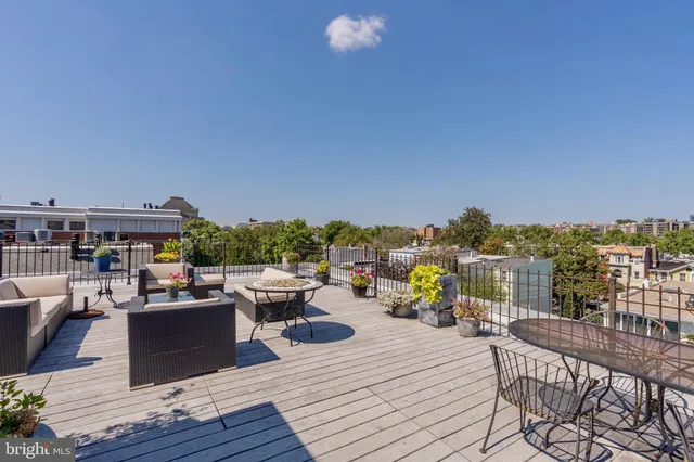 a view of a terrace with furniture