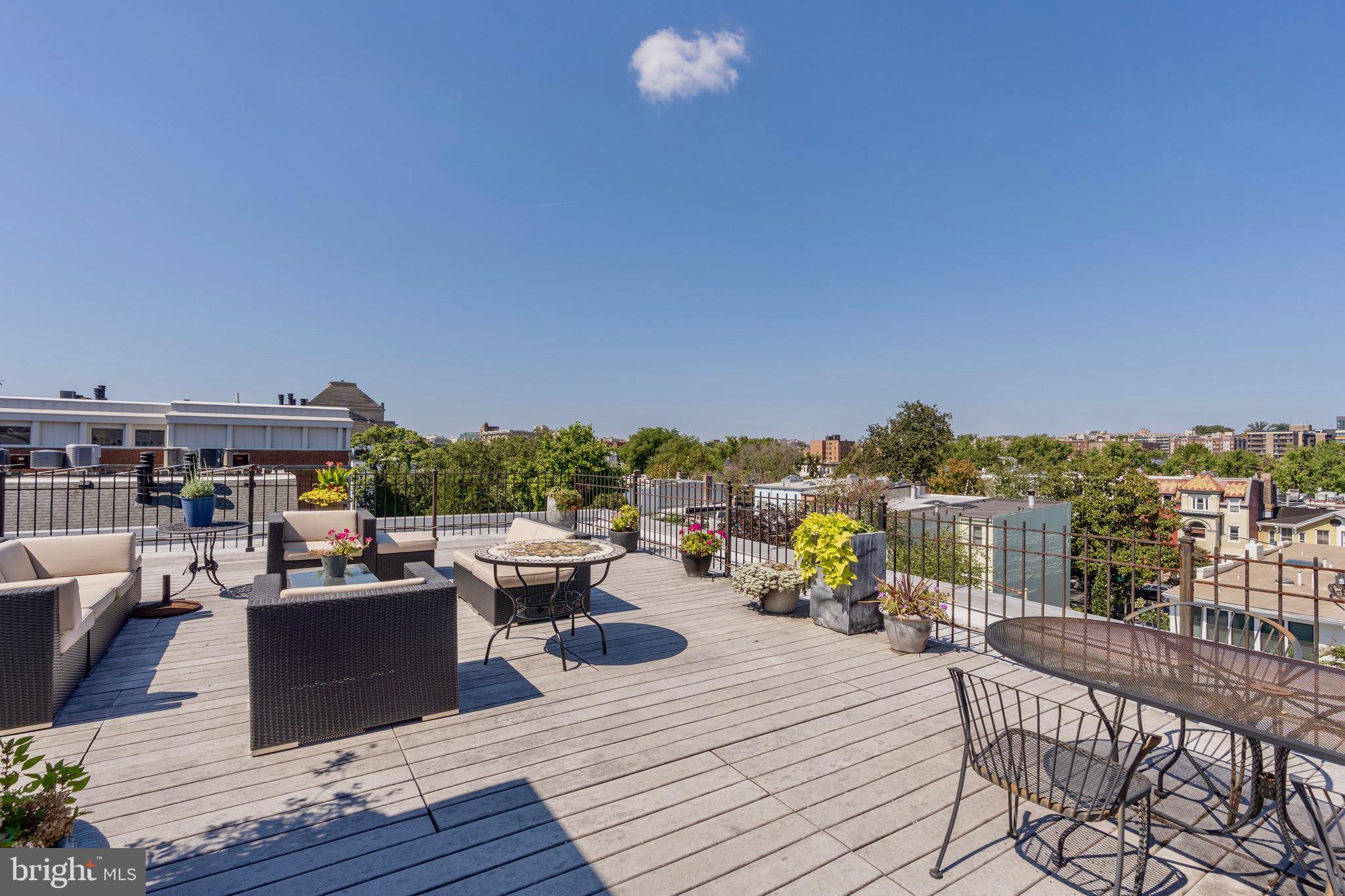 1741 Johnson Avenue Northwest, Unit 301 Washington, DC 20009 - Photo 28 of 31 a view of a terrace with furniture