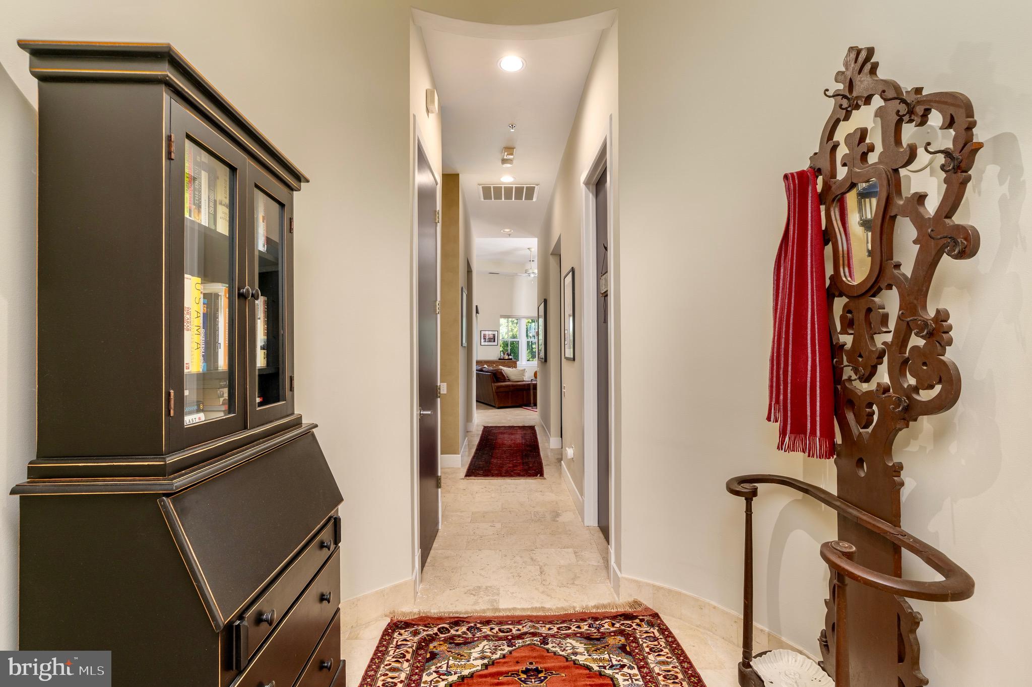 1741 Johnson Avenue Northwest, Unit 301 Washington, DC 20009 - Photo 3 of 31 a view of a hallway with entryway and furniture