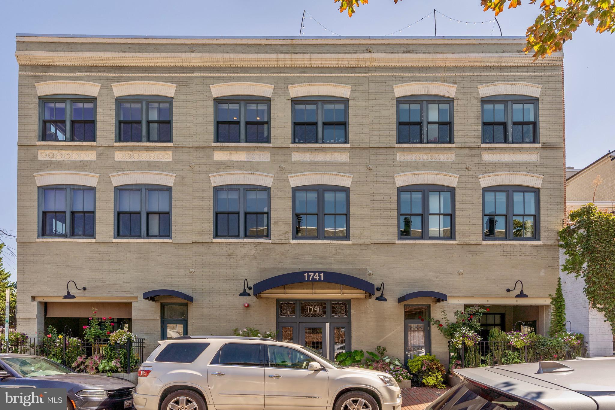 1741 Johnson Avenue Northwest, Unit 301 Washington, DC 20009 - Photo 31 of 31 a front view of multiple houses