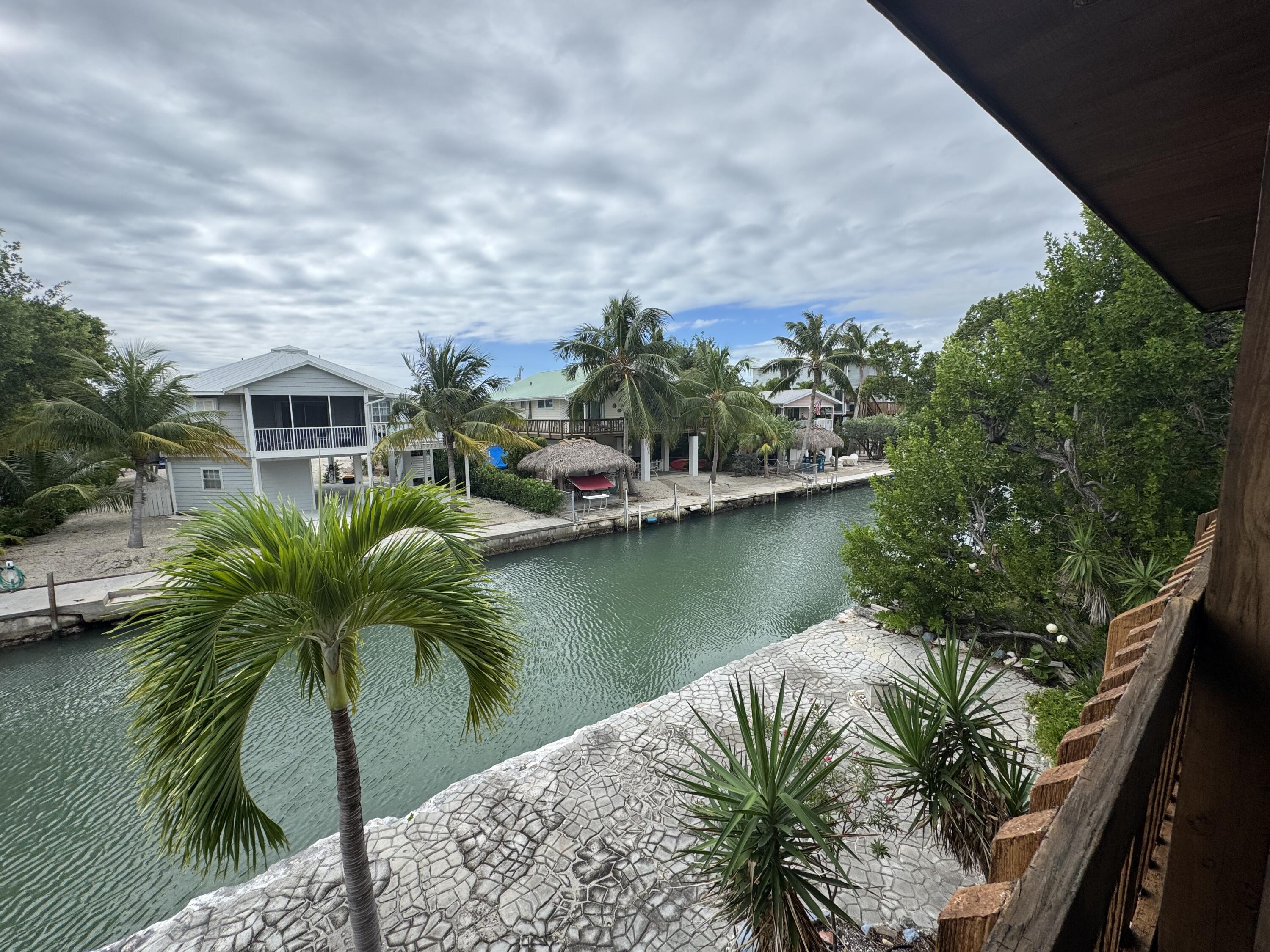 22970 Sharp Lane Cudjoe, FL 33042 - Photo 19 of 45 a view of a lake in front of house