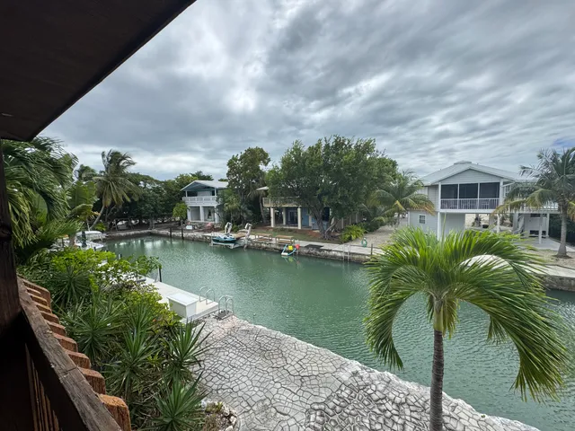 a view of a lake with a house