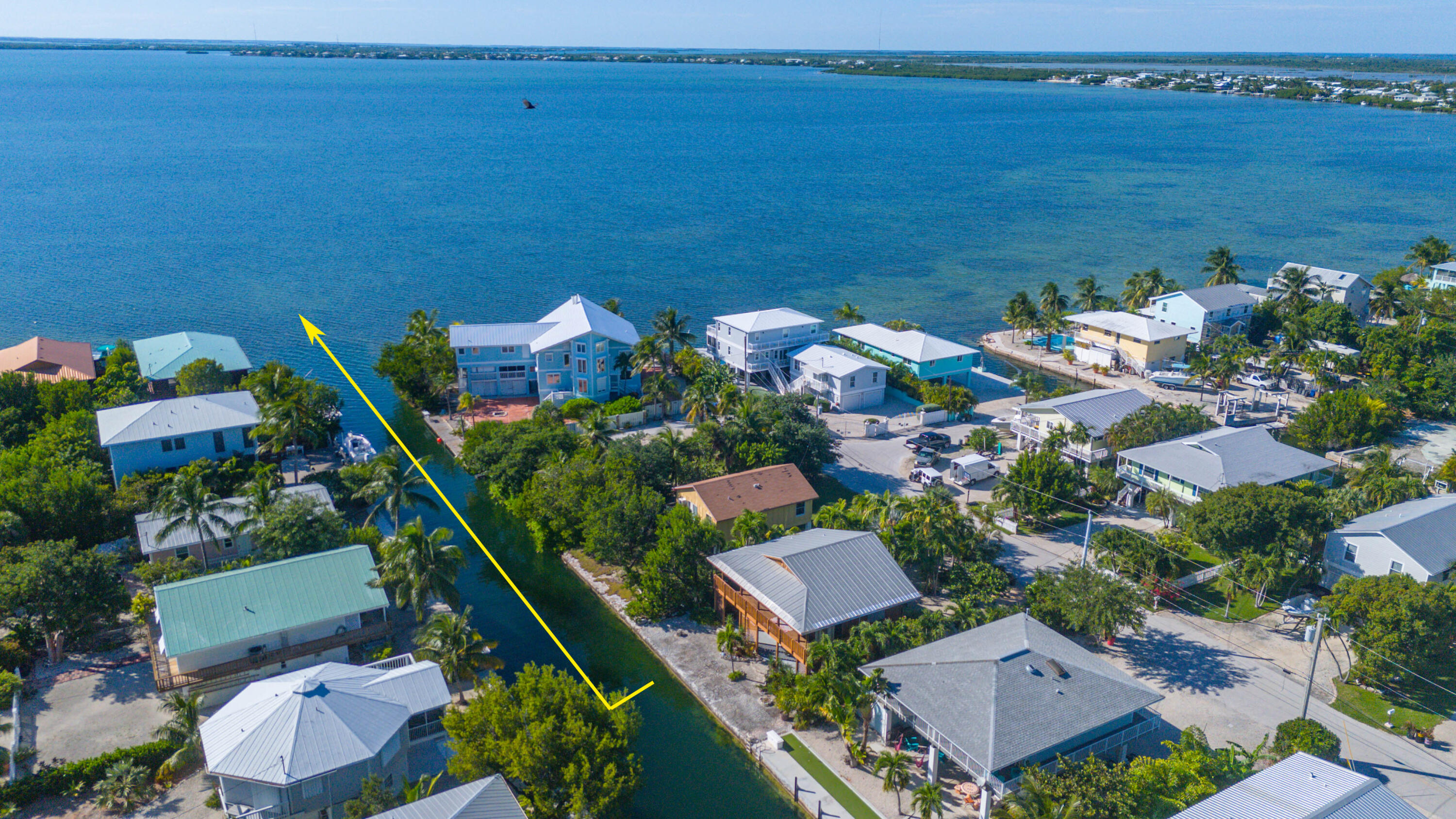 22970 Sharp Lane Cudjoe, FL 33042 - Photo 33 of 45 an aerial view of a house with a garden view