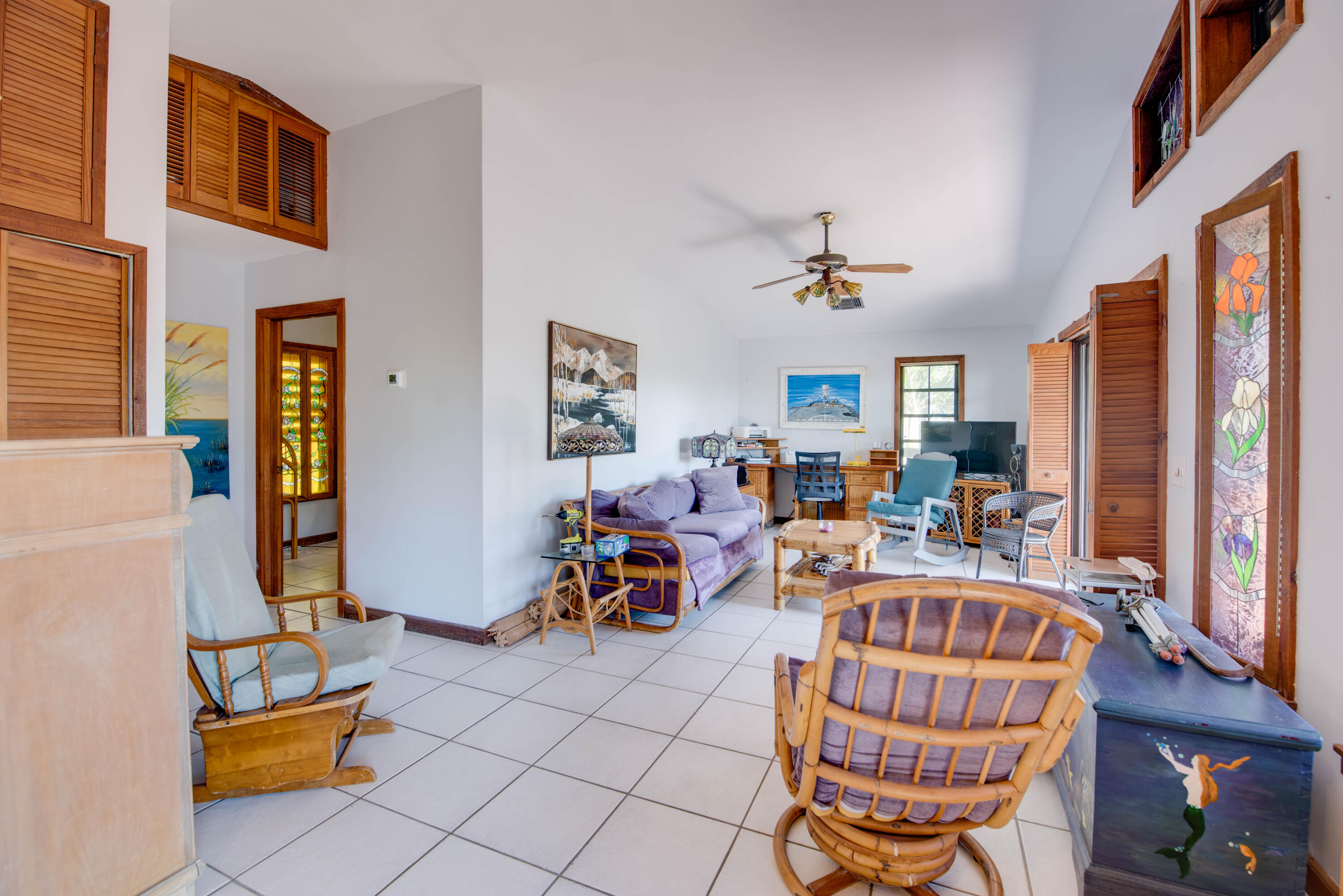 22970 Sharp Lane Cudjoe, FL 33042 - Photo 39 of 45 a bedroom with furniture and a window