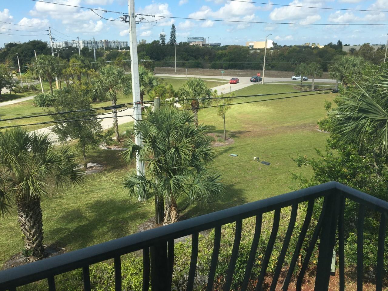 555 Northwest 35th Place Boca Raton, FL 33431 - Photo 36 of 43 a view of swimming pool from a balcony