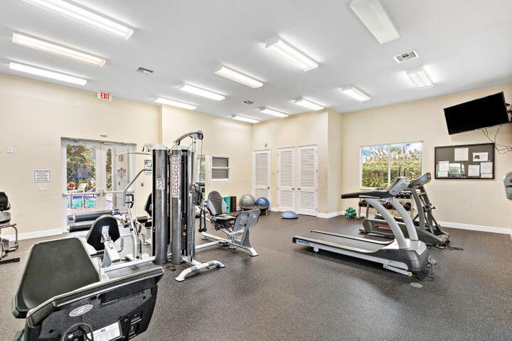 555 Northwest 35th Place Boca Raton, FL 33431 - Photo 38 of 43 a view of a room with gym equipment