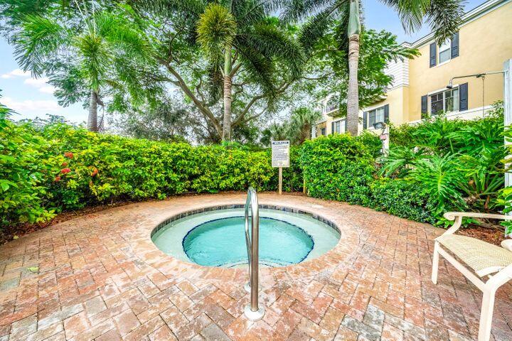 555 Northwest 35th Place Boca Raton, FL 33431 - Photo 42 of 43 a swimming pool with view od palm trees
